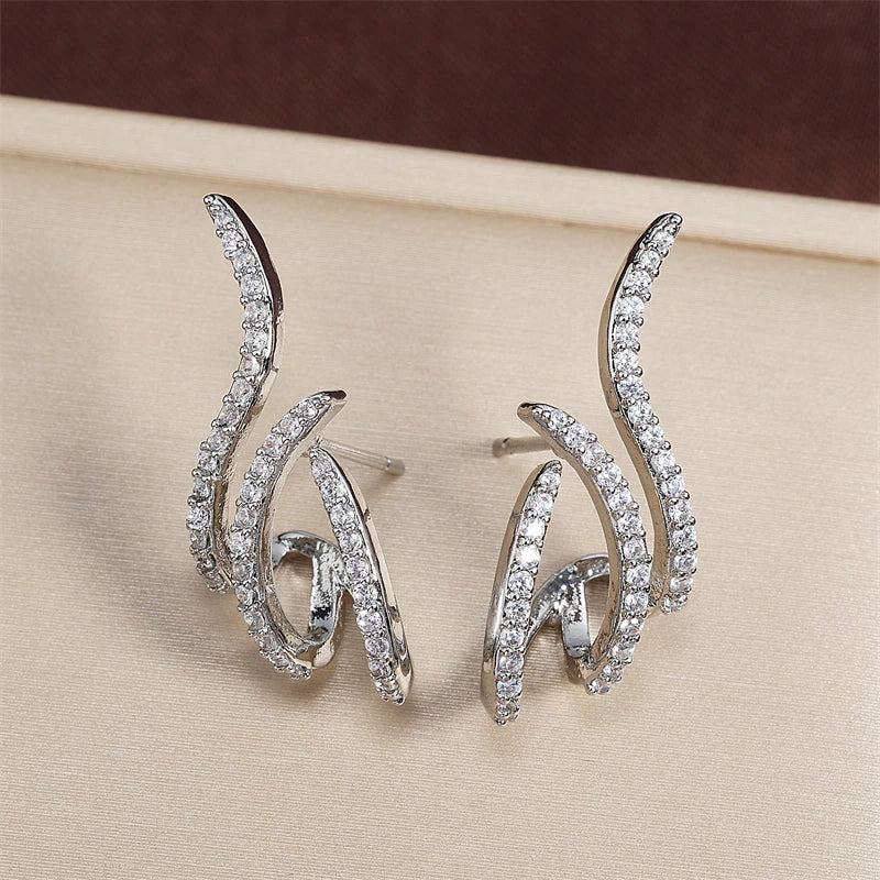 RAKOL - Three Claws Stud Earrings