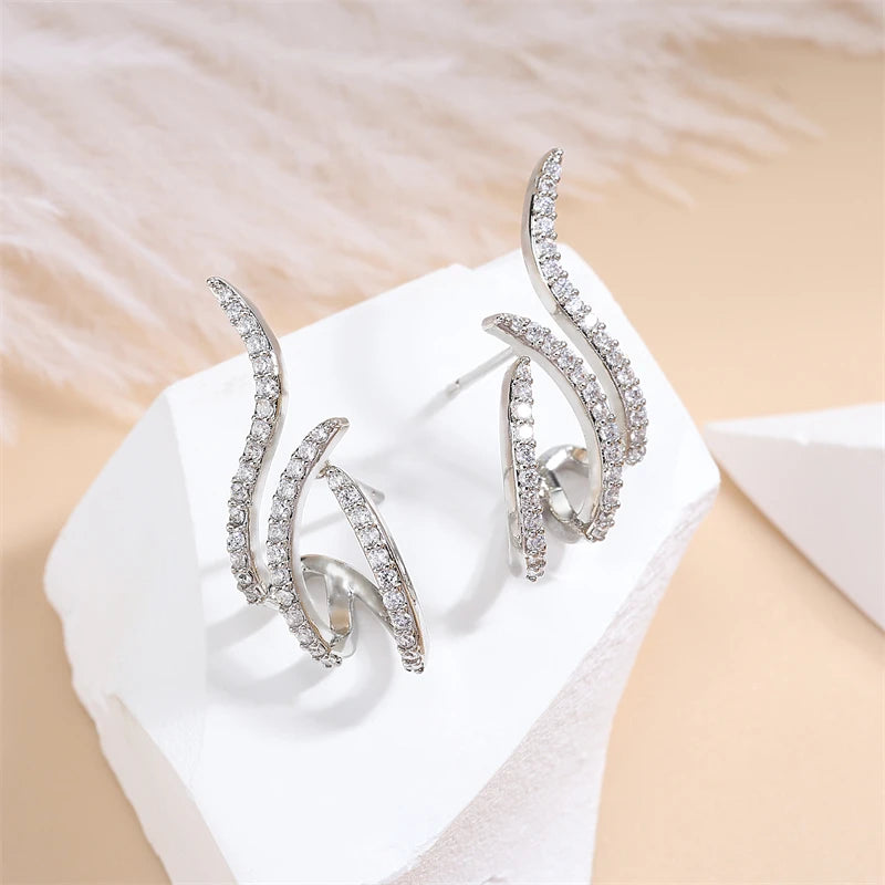 RAKOL - Three Claws Stud Earrings